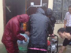 不畏艰难抗洪险，齐心协力保通信